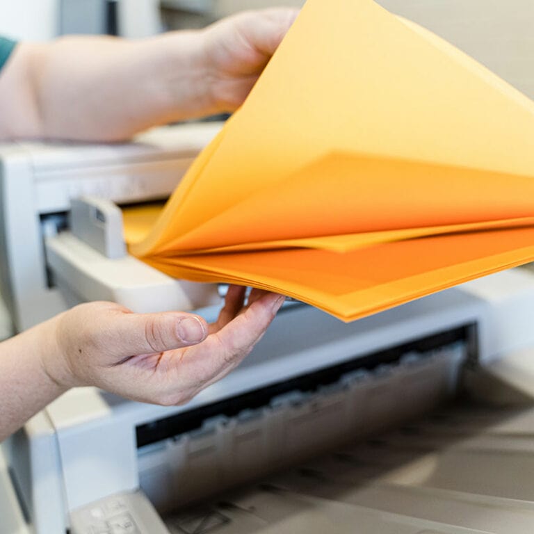 Yellow paper out of a printer.