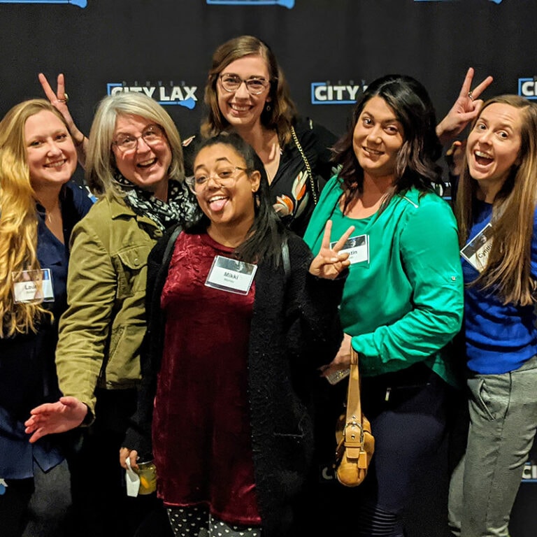 YellowDog staff celebrating at a nonprofit event.