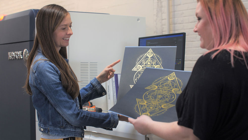 black posters with gold ink