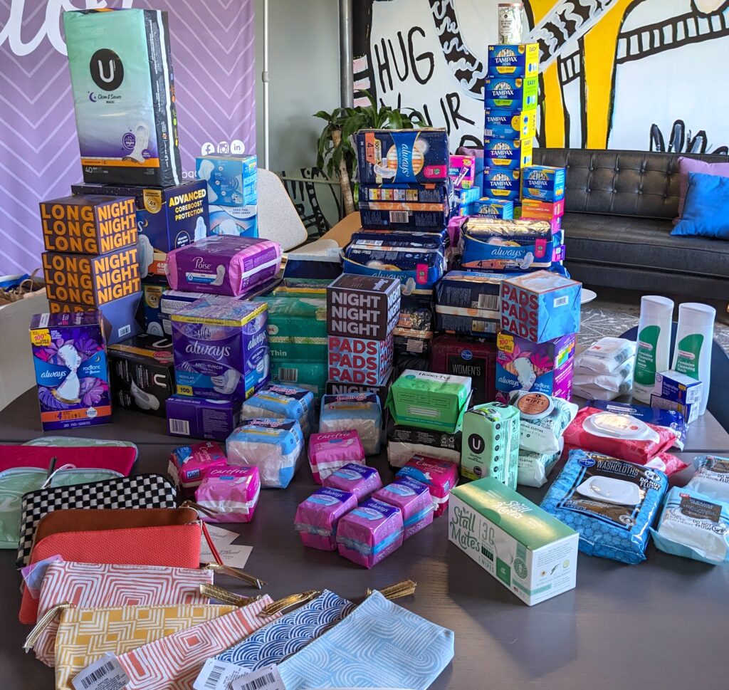 YellowDog period drive results: 3,584 menstrual hygiene products stacked up together.