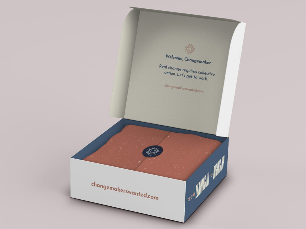 Custom designed and printed box featuring the Changemaker's spark and the words: "Welcome, Changemaker. Real change requires collective action. Let's get to work. ChangemakersWanted.com"