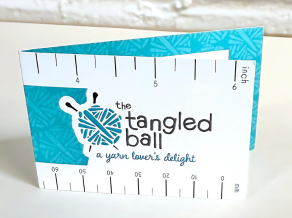 The Tangled Ball (a yarn lover's delight) business card that folds out into a measuring tape.